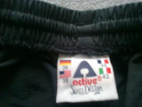 Dámske 3/4 športovo-elegantné nohavice, 38