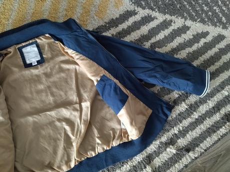 Prechodná tenká bunda, 122