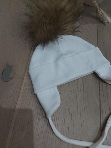 Čiapka s bombrlcom, 68