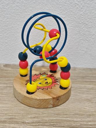 Drevená hračka hlavolam, 