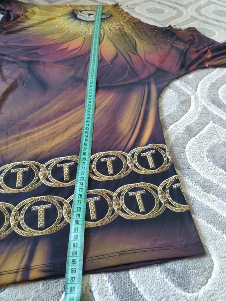 Asymetrická tunika b, m