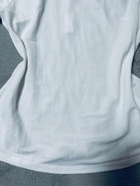 Biela lesklá elastická blúzka s mašľou zn. magenta, m