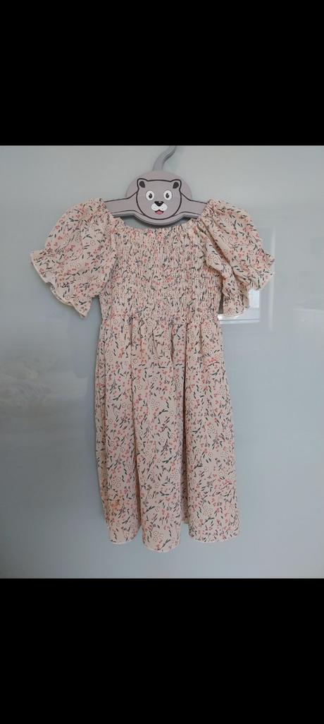 Kvetinové šaty, 110