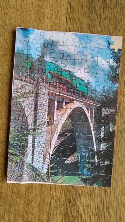 Puzzle - tučniaci, viadukt,