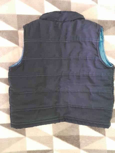 Prechodná vestička značky tots, 92