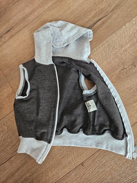 Tepláková vesta, 74