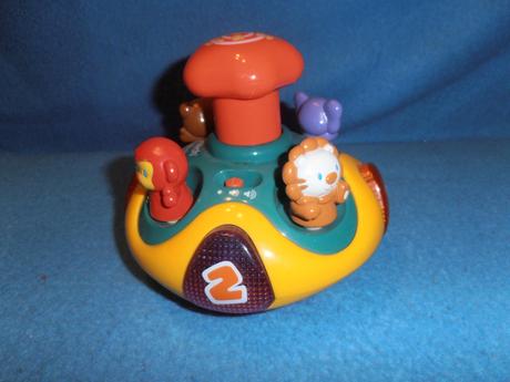 Hrajúci a svietiaci kolotoč - v nemčine,