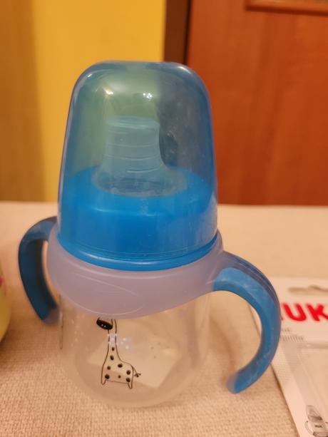 Nuk flašky a nové náustky nuk, nuk