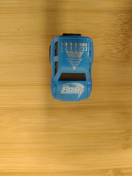 Modré autíčko na zotrvačník, mini racer, 5 cm, 