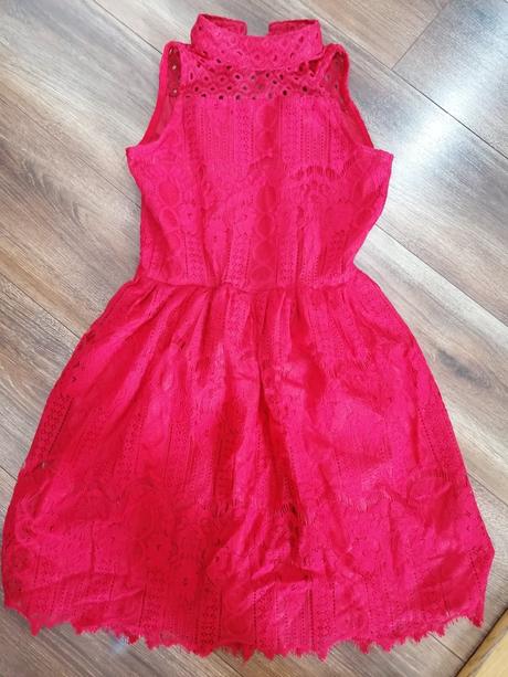 Červené šaty, 164