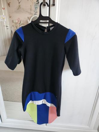 Zaujímavé šaty značky voga, 134