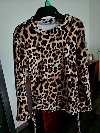 Leopardí top, 116