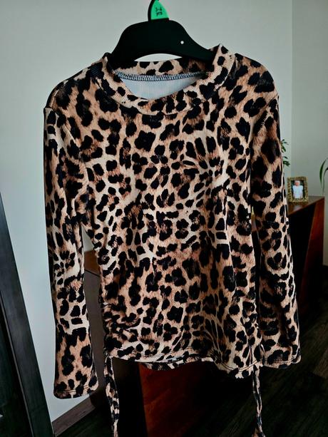 Leopardí top, 116