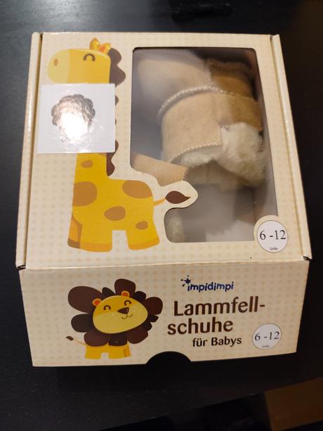 Detské capačky s jahnacou kožušinou, 