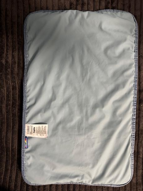 Prebaľovacia podložka do tašky lupilu,