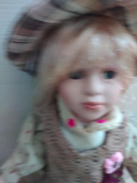 Porcelánová bábika,