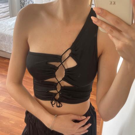 Čierny asymetrický top, xs