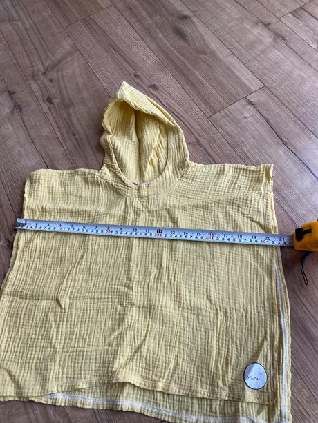 Muselinove ponco na plaz, 