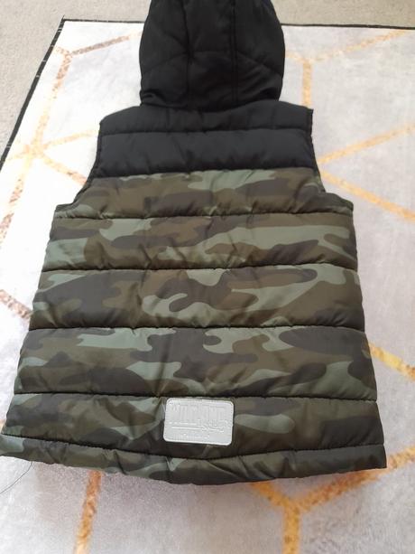 Maskáčová vesta, 116