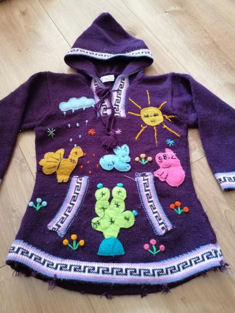 Fialový svetrík, 86