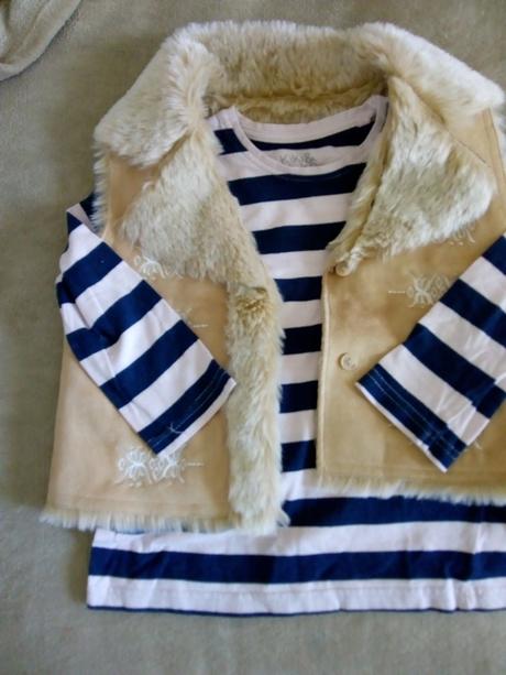 Vesta s kožušinou, 92