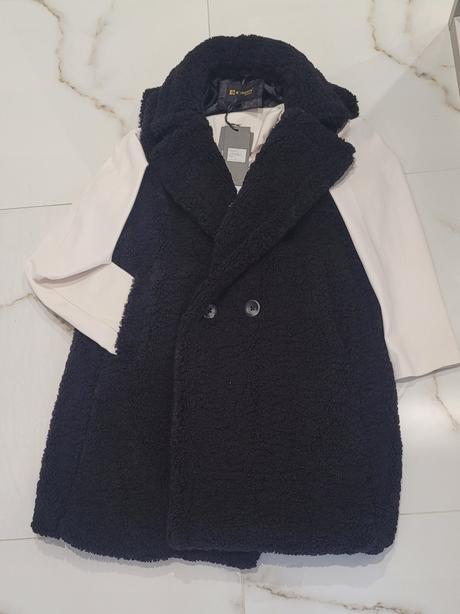 Dámska kožušinová vesta, l