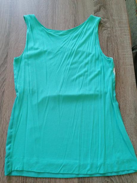 Tyrkysová bluzka, 34