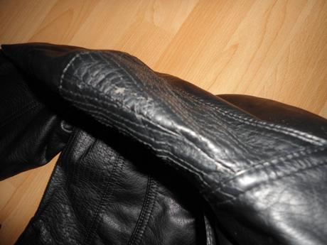 Cierna kozenkova bunda, 176