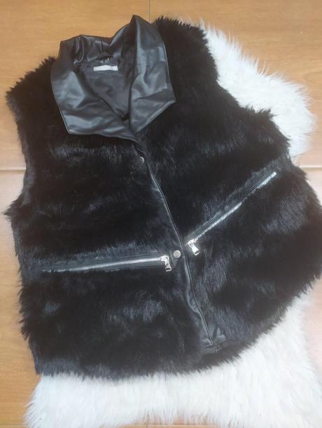 Kožušinova vesta, l