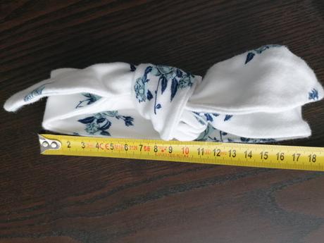 Overal s čelenkou, 68