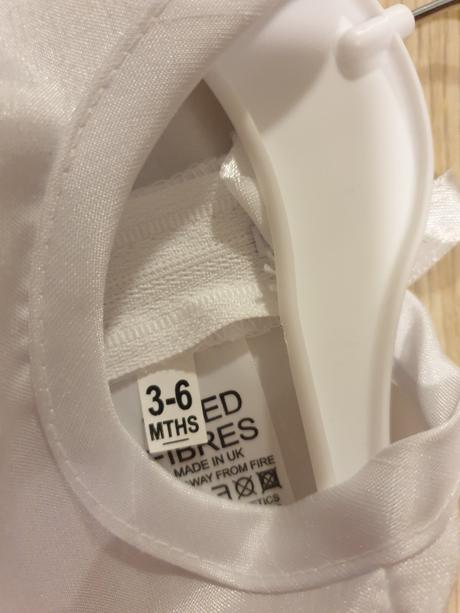 Oblečenie na krst, 68