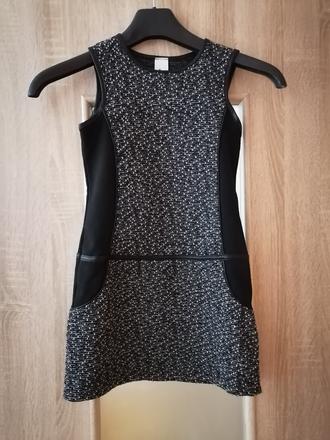 Tvídové šaty, 134