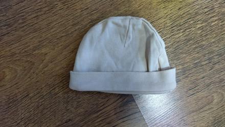 Prechodná čiapka, 62