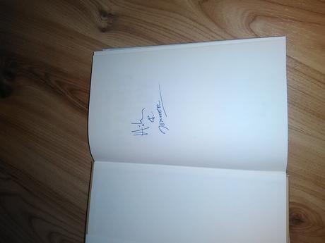 Plamene túžby s podpisom autora, 