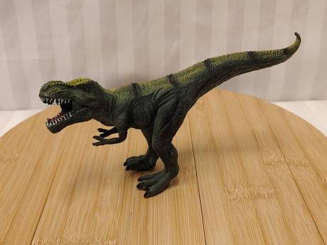 Zberat figúrka dinosaura t-rex pruhované maskovani,