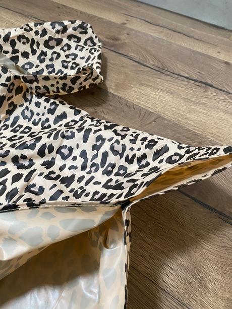 Pončo pršiplášť, 104