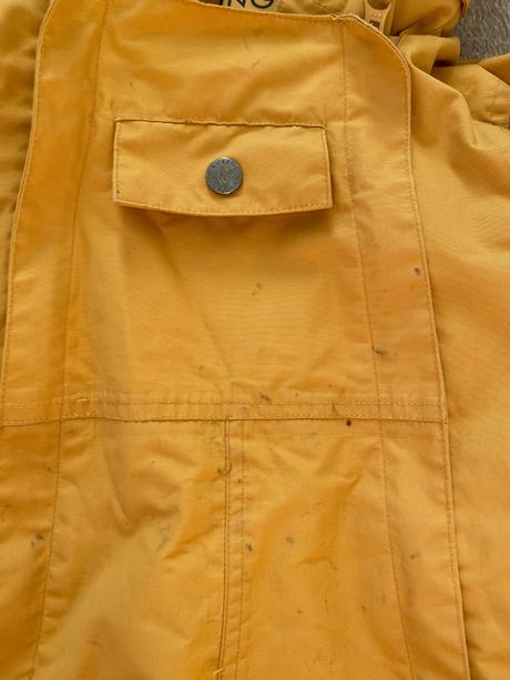 Kombinéza do dažďa, 92