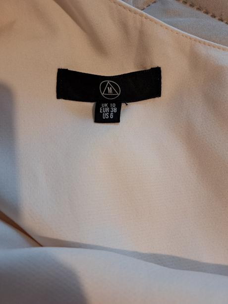 Spoločenský overal, 38