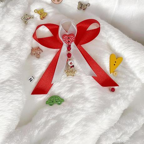 Mašlička na kočík s príveskom, 