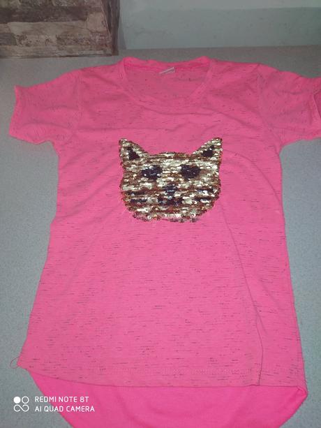 Tričko s meniacim obrázkom, 152