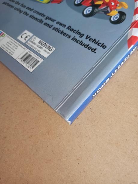 Racing vehicles - stencil activity book,