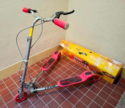 Trojkolesová kolobežka,