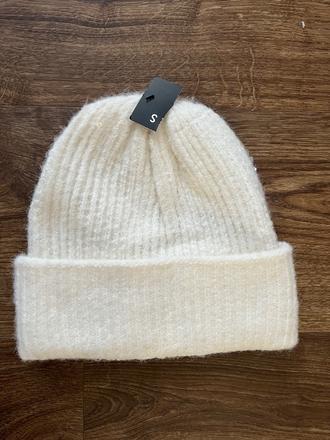 Čiapka s flitrami, new yorker