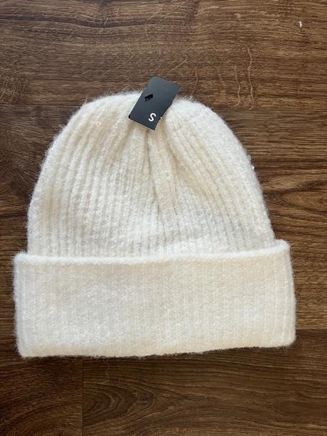 Čiapka s flitrami, new yorker