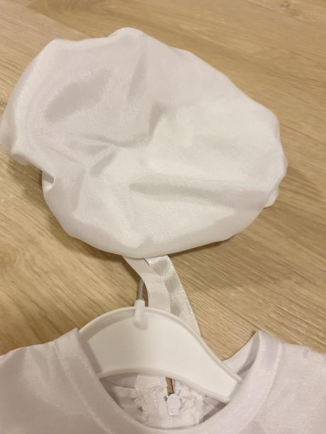 Oblečenie na krst, 68