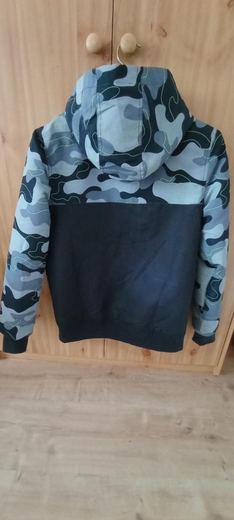 Prechodná bunda, 164