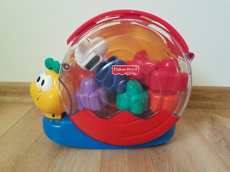 Hudobny slimak s kockami fisher price, 