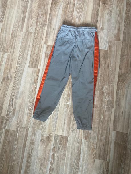 Šušťákové nepremokave nohavice reflexne do dazda, reserved,128