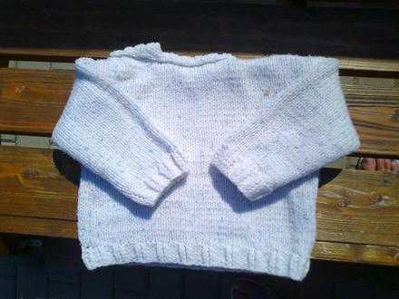 Sveter s čiapkou, 62