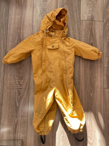 Kombinéza do dažďa, 92